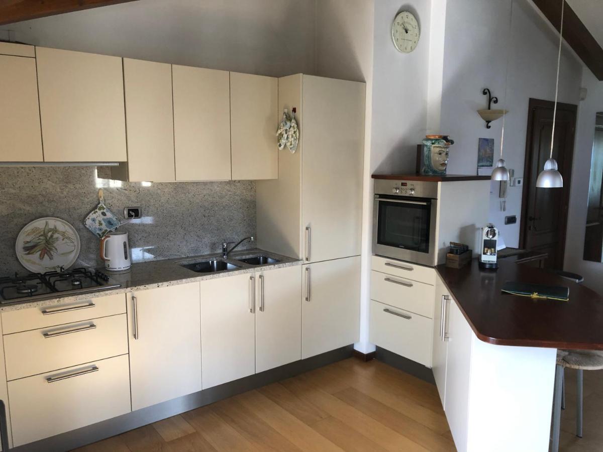 Alveluu Ristorante E Suites Tremezzo Bagian luar foto