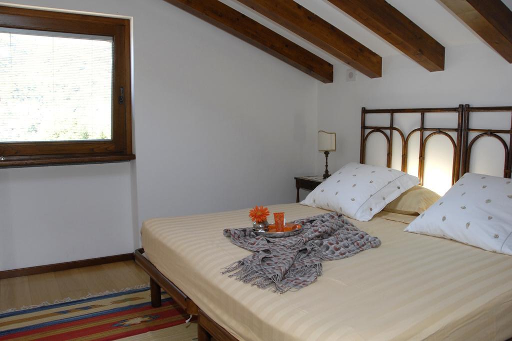 Alveluu Ristorante E Suites Tremezzo Ruang foto