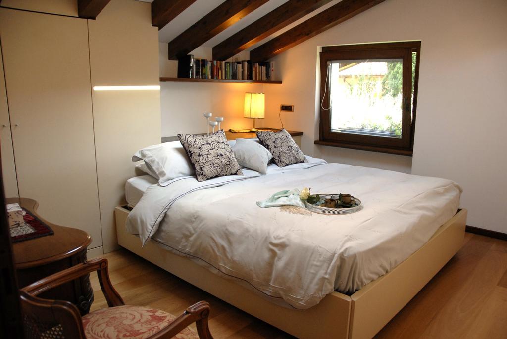 Alveluu Ristorante E Suites Tremezzo Ruang foto