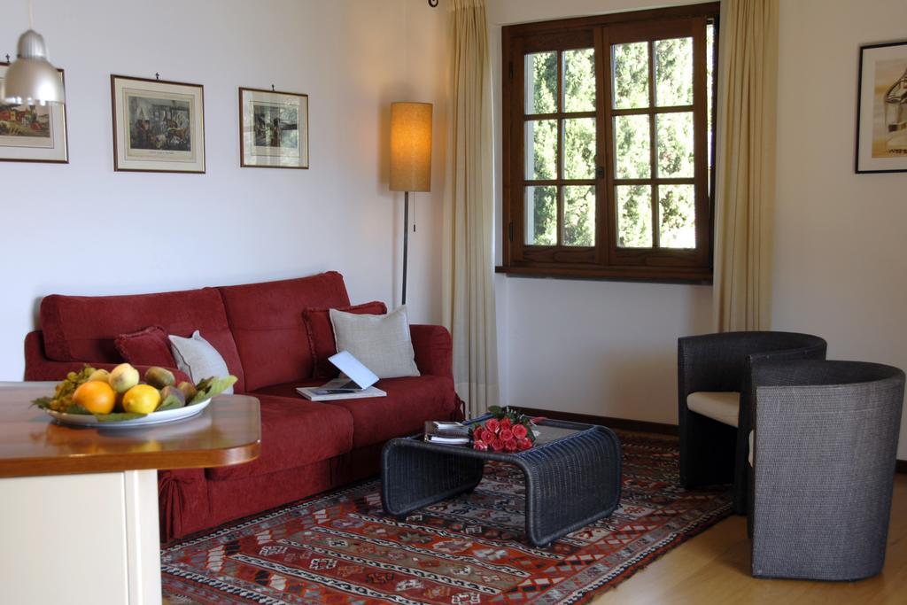 Alveluu Ristorante E Suites Tremezzo Ruang foto