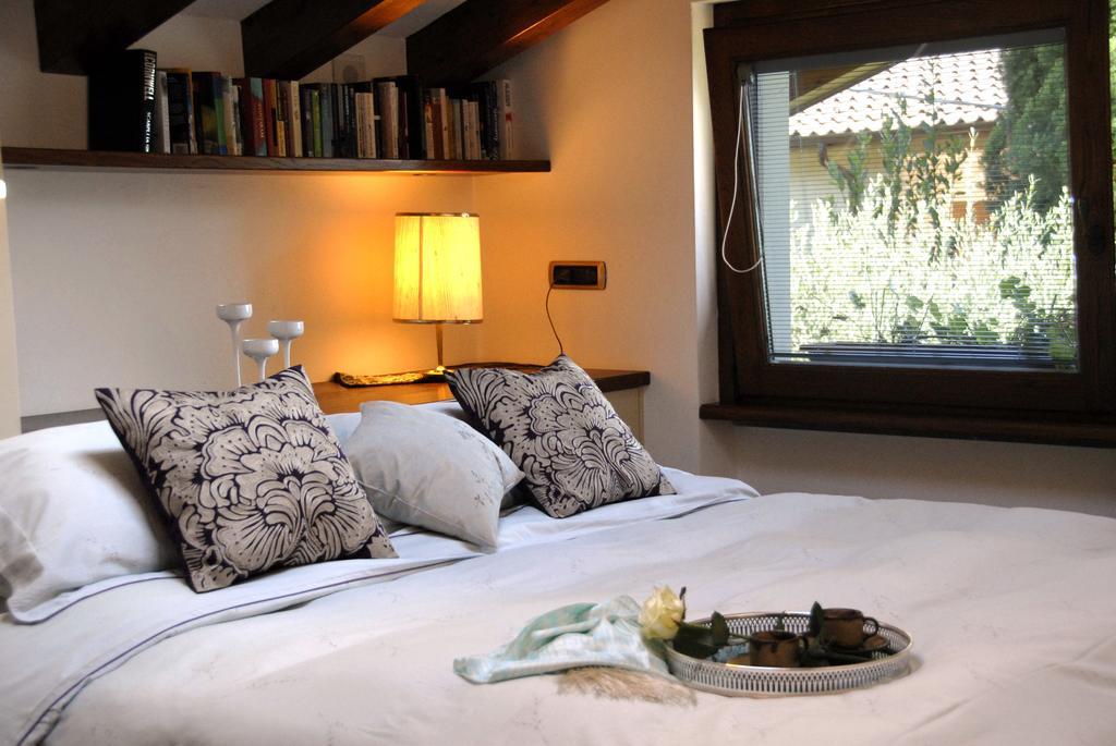 Alveluu Ristorante E Suites Tremezzo Ruang foto